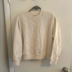 Cream Sweatshirt with Subtle Embellishments